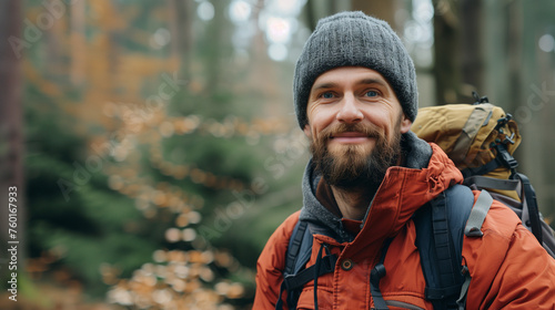 Portrait of one man nature lover or hiker in the forest woods