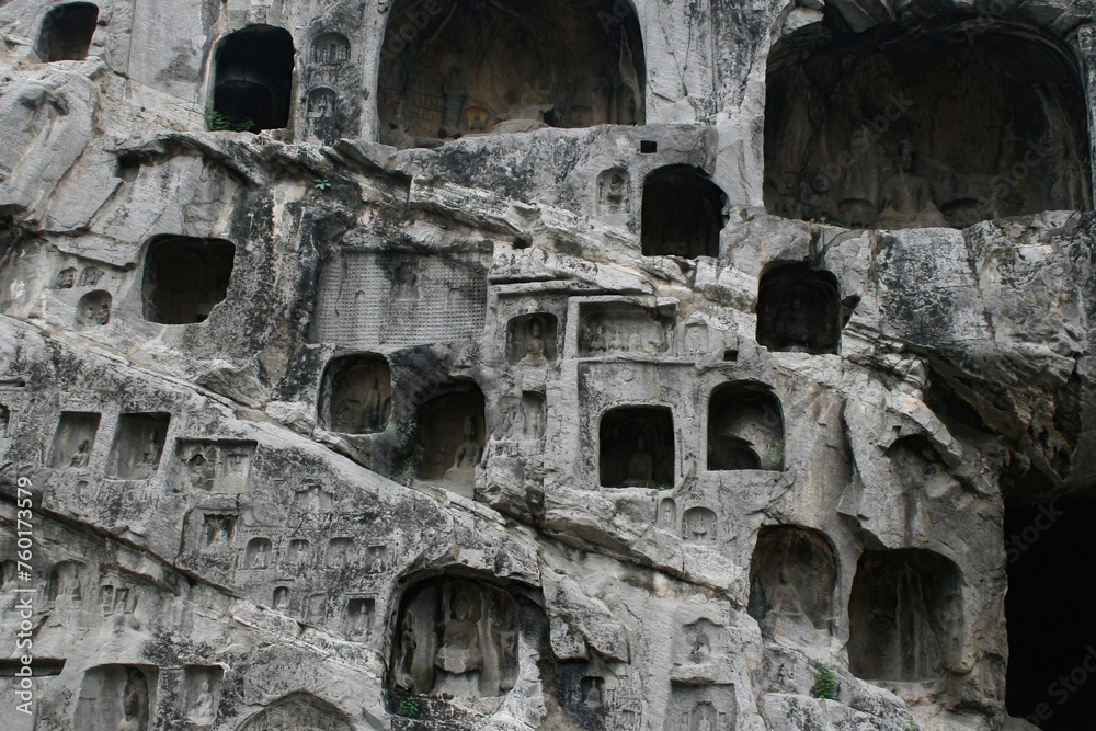 Longmen Grottoes are a series of rock shrines in which Buddhist subjects are portrayed, a UNESCO heritage site is one of the most famous sites in China (1)