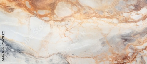 A close up of a beige marble texture resembling a painting. The natural material has a peach and wood pattern, creating a flooring that mimics the beauty of a rock or fur © AkuAku