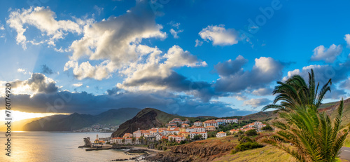 Sunset on Ponta de Sao Lourenco peninsula with traditional resort village. Madeira Island Portugal. photo