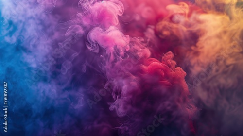 A plume of multi coloured smoke. Pink, purple, blue and red smoky background. 