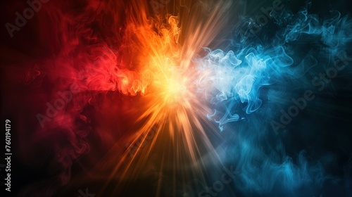 a colourful light burst from a black smoky background with red, blue and orange colours, abstract. photo