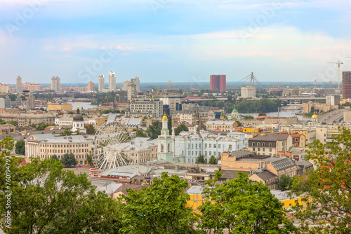 beautiful panoramic views of Kyiv with old and new buildings. view from Podol to the left bank photo