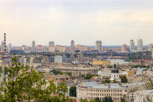 beautiful panoramic views of Kyiv with old and new buildings. view from Podol to the left bank © serhii