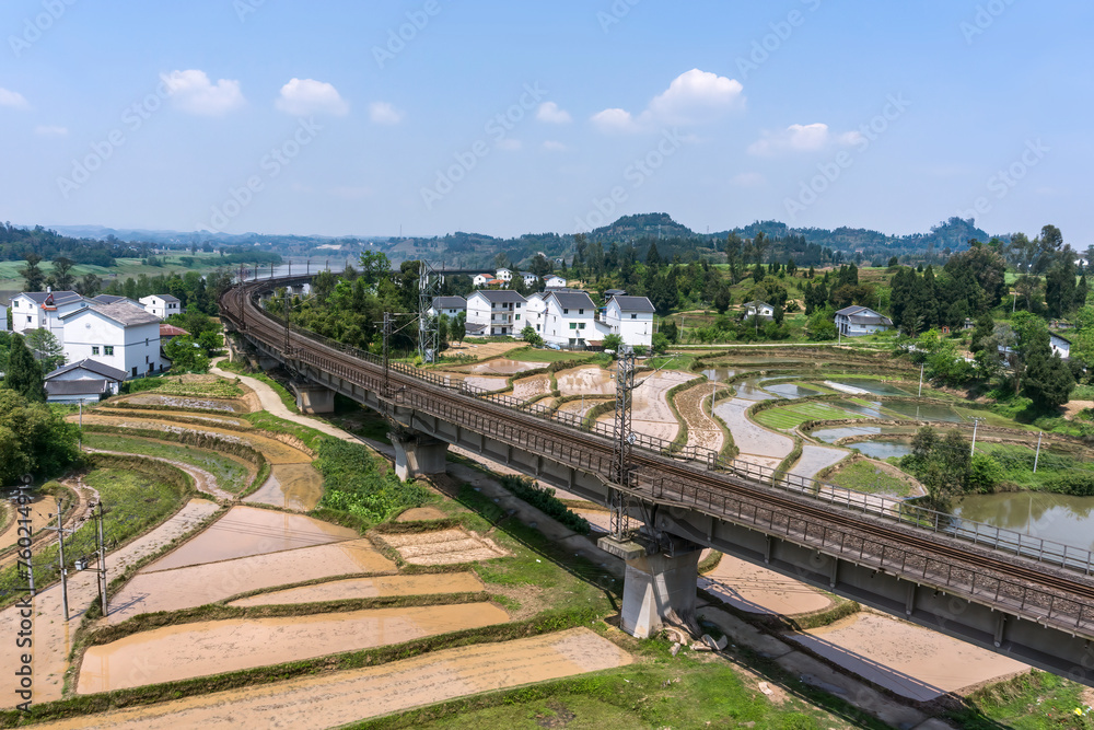 Scenic Rural Landscape with Winding Railway Track