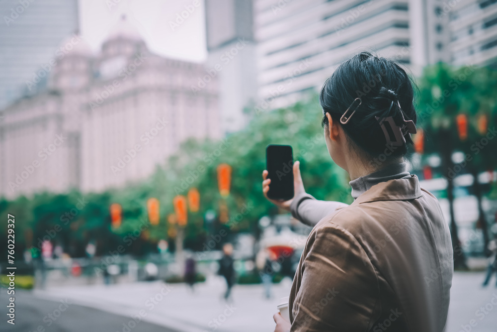 Young Woman Taking Photos in Urban Setting Young Woman Taking Photos in Urban Setting