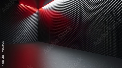 Studio interior with carbon fiber texture. Modern carbon fiber textured red black interior with light. Background for mounting, product placement