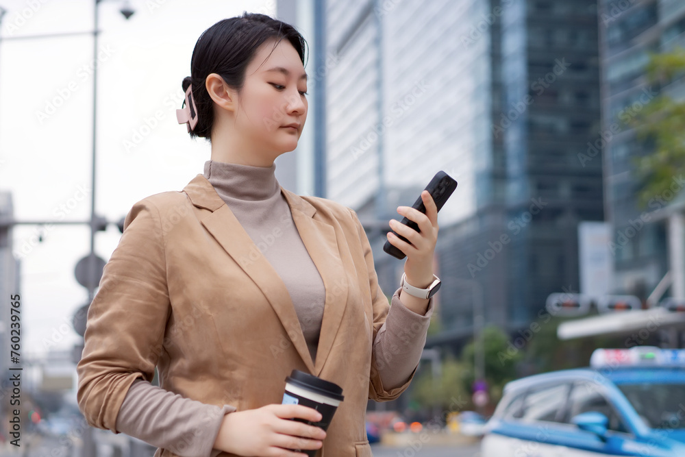 Businesswoman Checking Phone During Coffee Break Businesswoman Checking Phone During Coffee Break