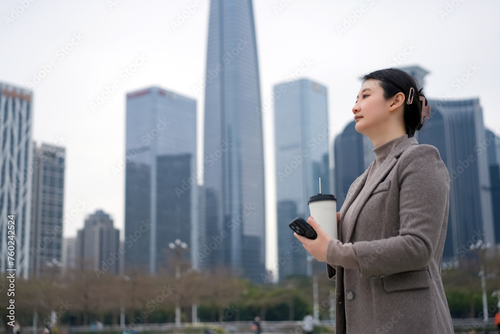 Confident Professional on Coffee Break in Urban Setting Confident Professional on Coffee Break in Urban Setting