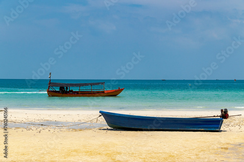Boats on the shore of the sea on the beach of Koh Roag Sanloem in Cambodia 5