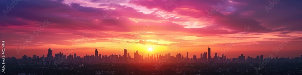 Vibrant sunrise casting hues over a city skyline.