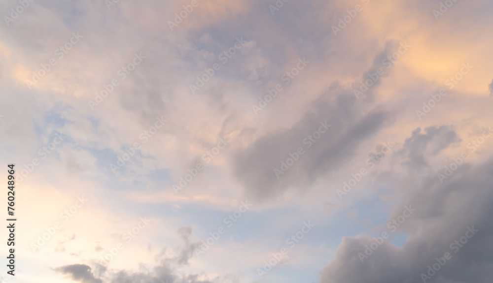 Sunset sky. Abstract nature background. Dramatic blue with orange colorful clouds in twilight time. Sunset sky. Abstract nature background. Dramatic blue with orange colorful clouds in twilight time.