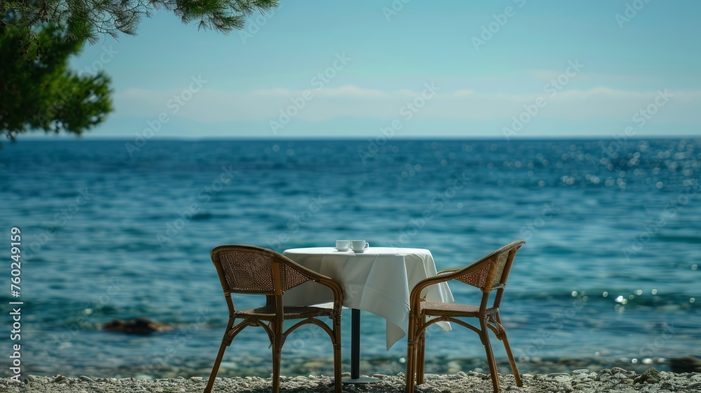 Beachside table setting with sea backdrop
