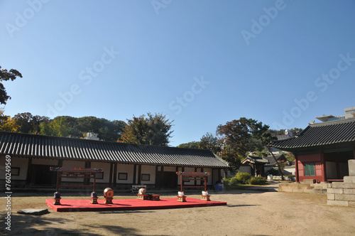 SEOUL, SOUTH KOREA - OCTOBER 24, 2022: Korean traditional musical instruments and main ground of Sungkyunkwan University in Autumn with foliage trees