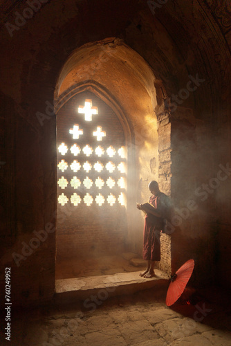 A monk in Burmese temples of Bagan City, Myanmar or Burma. People lifestyle.