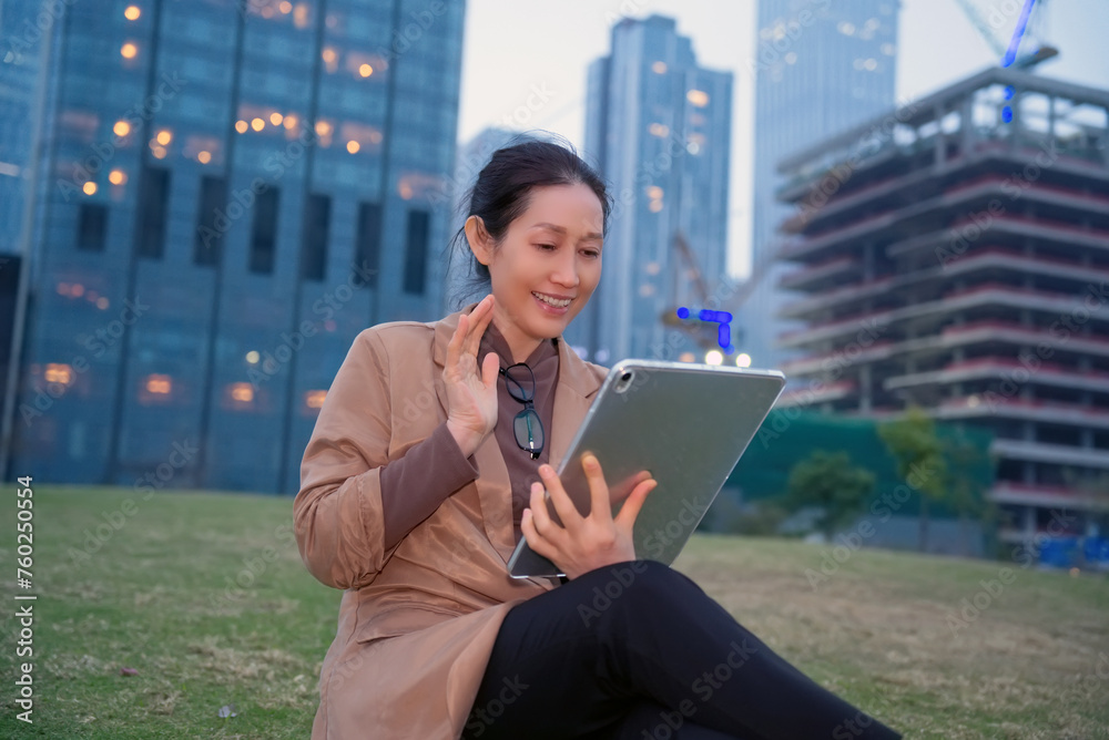 Businesswoman Having a Video Call Outdoors Businesswoman Having a Video Call Outdoors