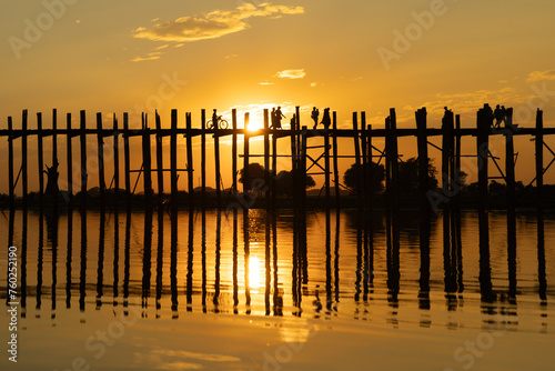 U Bein Bridge with lake, Wooden Bridge in Mon village, Myanmar or Burma, Asia. photo