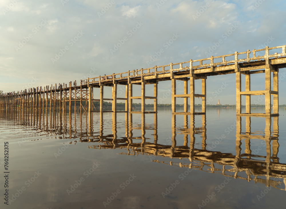U Bein Bridge with lake, Wooden Bridge in Mon village, Myanmar or Burma, Asia. U Bein Bridge with lake, Wooden Bridge in Mon village, Myanmar or Burma, Asia.