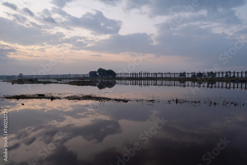 U Bein Bridge with lake, Wooden Bridge in Mon village, Myanmar or Burma, Asia. photo