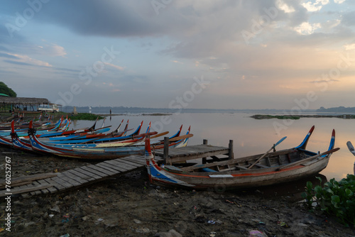 U Bein Bridge with lake  Wooden Bridge in Mon village  Myanmar or Burma  Asia.