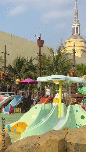 Aqua Park Palm trees roller coaster rides games Water park slides palm trees slides attractions recreation for children and adults great time Vinpearl, VinWonders Nam Hoi An, Quang Nam photo