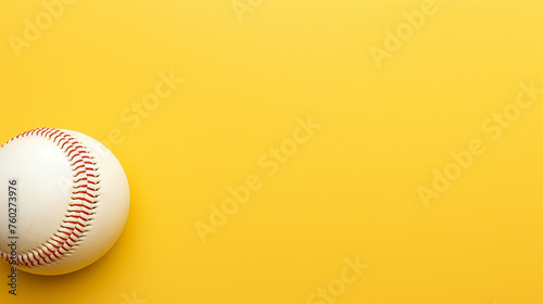 Baseball ball on a yellow background with copy space for text