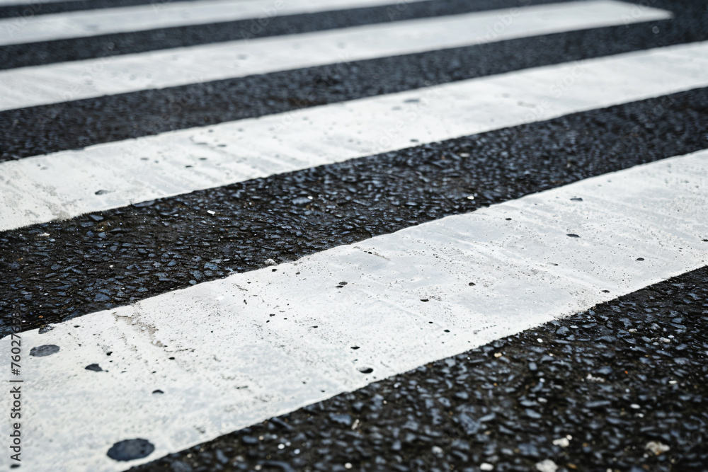 Fototapeta premium a crosswalk with a white stripe on the street