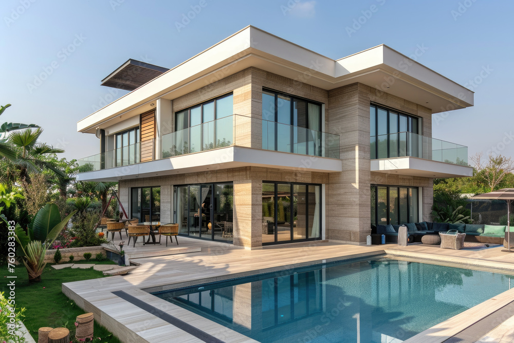 modern two-story house with a swimming pool in the backyard, beige walls and glass window