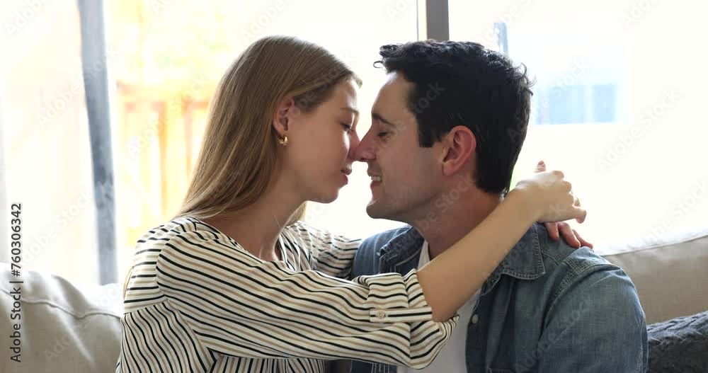 Beautiful young Hispanic couple in love kissing, depicts tender moment of affection and connection, having deeply emotional bond. Intimacy, passion between romantic partners, relationships, close up Beautiful young Hispanic couple in love kissing, depicts tender moment of affection and connection, having deeply emotional bond. Intimacy, passion between romantic partners, relationships, close up