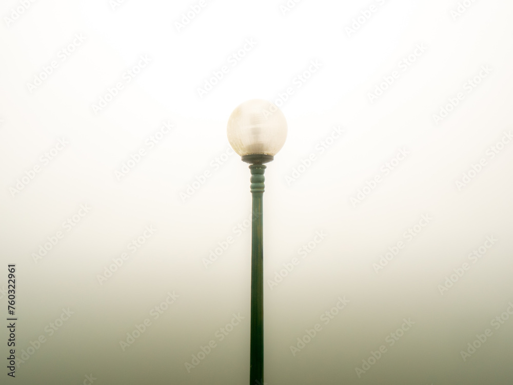 Single Round Lamp on a Black Pole Single Round Lamp on a Black Pole