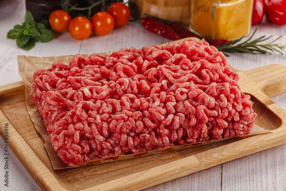 Raw minced beef meat over board Raw minced beef meat over board