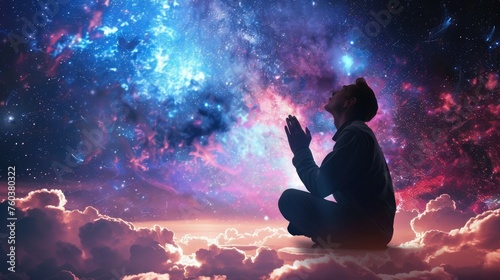 man praying infront of universe nebula or galaxy night sky view photo