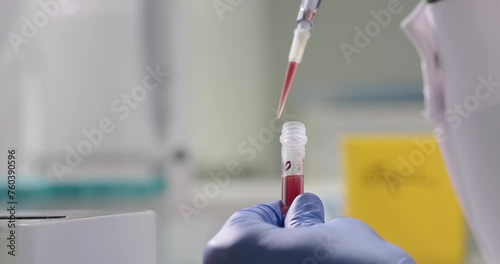 Chemist or scientist holds liquid sample. Scientific laboratory of biotechnology, chemistry, biochemistry and scientific experiment. Chemicals development for medical research