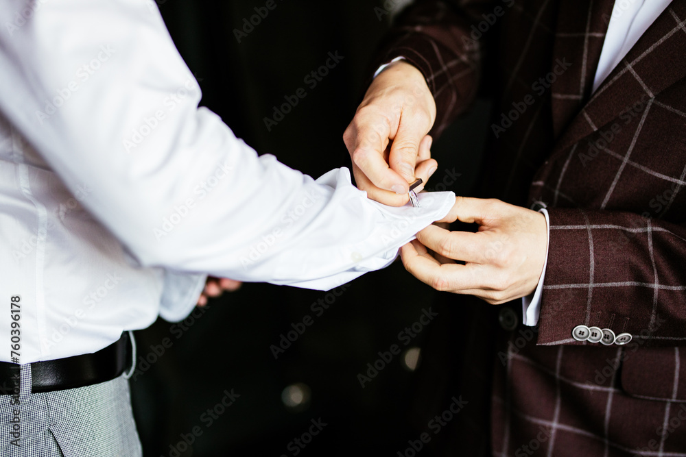 Wedding Preparation Groom and Best Man Getting Ready and Dressing up Stud Suit for Wedding Day