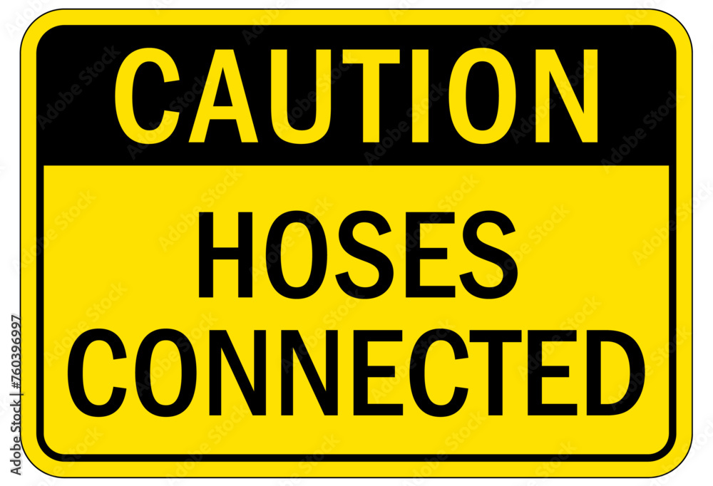 Railroad safety sign hoses connected Railroad safety sign hoses connected