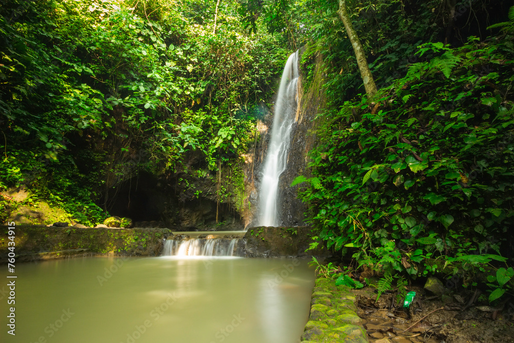 Long exposure of Batu Putu waterfall in lampung, indonesia Long exposure of Batu Putu waterfall in lampung, indonesia