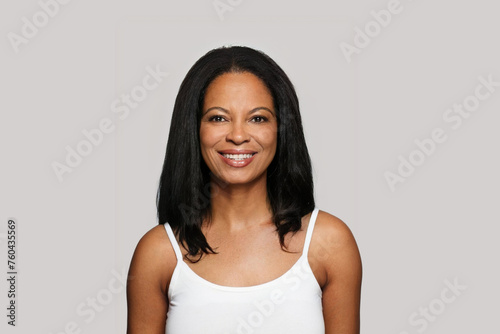 Beautiful mature woman with healthy skin, wrinkles and cute smile. Cosmetology, skincare, facial treatment concept