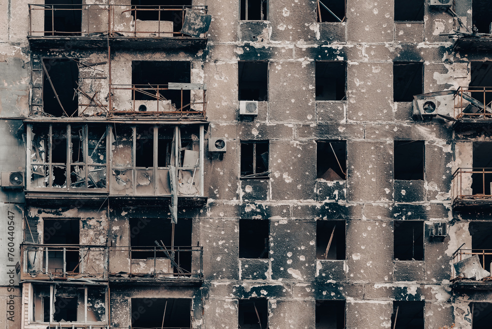 destroyed and burned houses in the city during the war in Ukraine