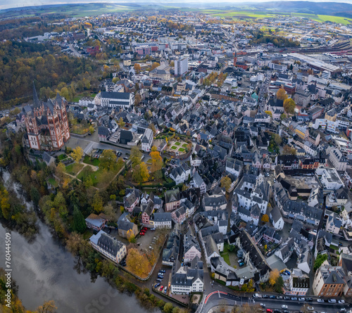 	
Aerial view around the old town of the city  Limburg in Germany on a cloudy day in autumn	
 photo