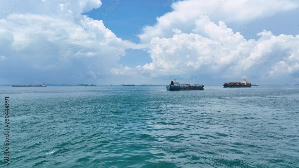 Aerial shot of bunker barge sailing, Singapore Straits, Singapore Aerial shot of bunker barge sailing, Singapore Straits, Singapore