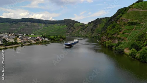 Inland shipping vessel gas transport over the river, vineyards mountains of Bernkastel. Gas tanker vessel at the river Moselle photo
