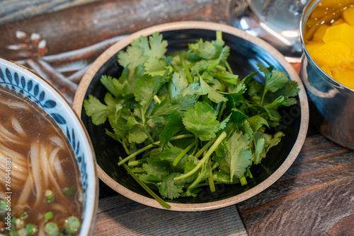 Closeup photo of cilantro, taken in a restaurant
