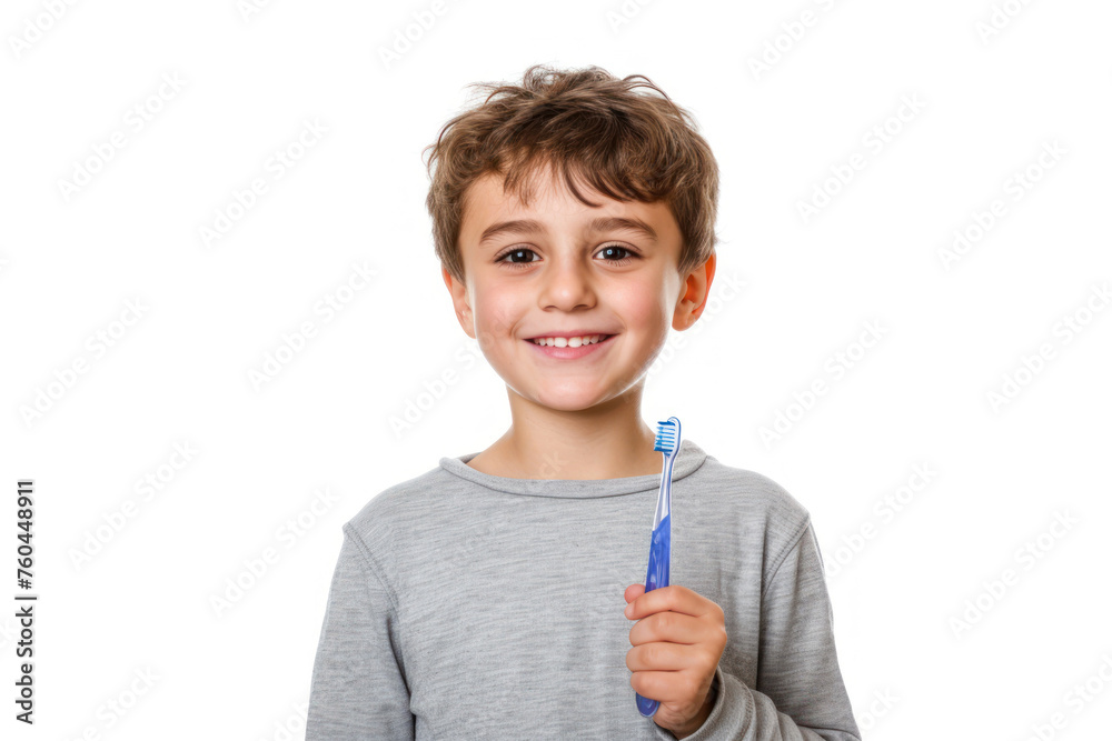 Smiling child boy holding a toothbrush white background Smiling child boy holding a toothbrush white background