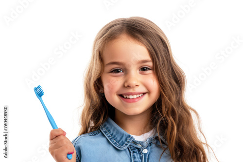 Smiling child girl holding a toothbrush on white background