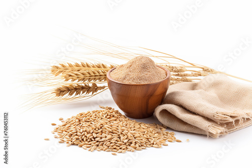 Spelt bran and grains with ears of wheat isolated on white background photo