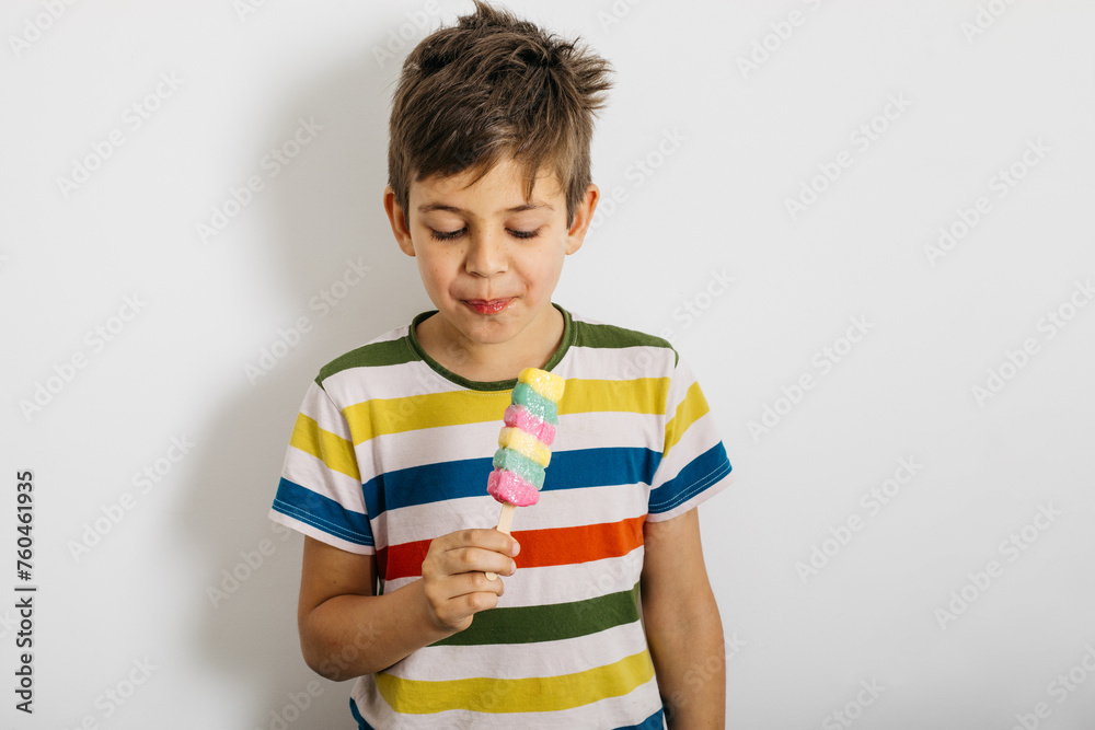 Adorable boy eating ice cream Adorable boy eating ice cream
