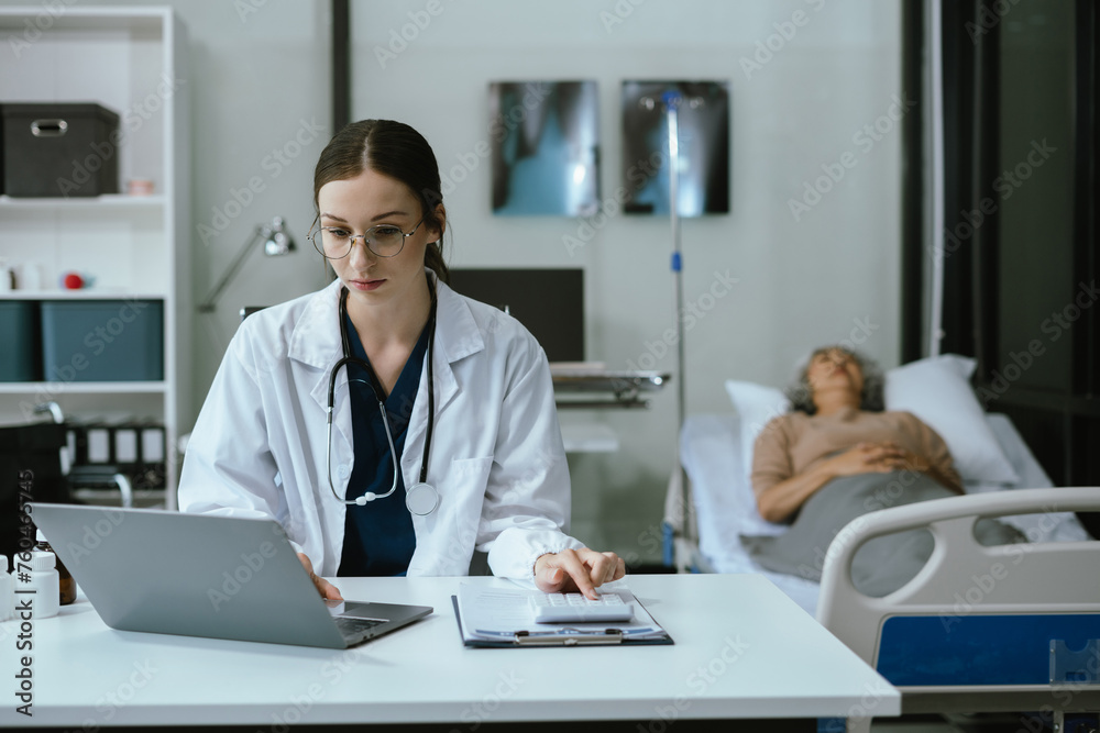Doctors use a service fee calculator to save money on health insurance, drug cost concepts. Doctors use a service fee calculator to save money on health insurance, drug cost concepts.