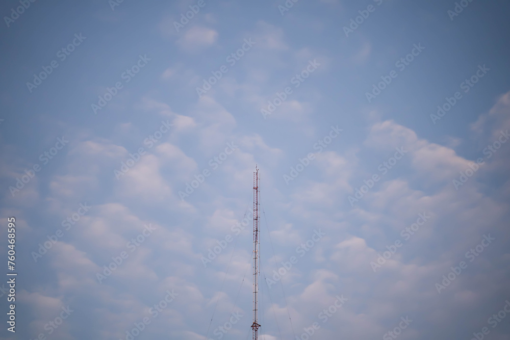 Transmission towers or cell phone towers on the morning sky background. Technology concepts in internet and mobile communication Transmission towers or cell phone towers on the morning sky background. Technology concepts in internet and mobile communication