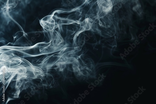 White smoke billowing out of a dark black background, creating an eerie and dramatic visual effect