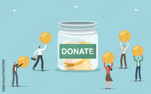 Donation and charity concept. Helping those in need and funding public organizations. People throw coins into a coin jar.